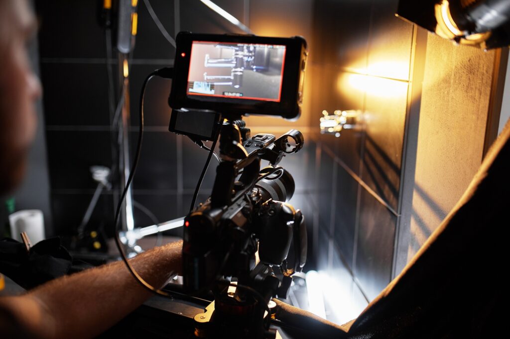 Video production backstage. Behind the scenes of creating video content, a professional team of