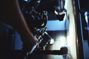 Video production backstage. Behind the scenes of creating video content, a professional team of