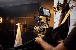 Video production backstage. Behind the scenes of creating video content, a professional team of