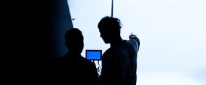 Video production behind the scenes. Making of TV commercial movie that film crew team lightman and c